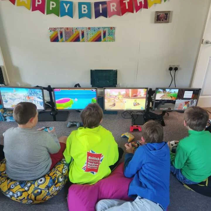 Boys at a gaming party in Bermondsey
